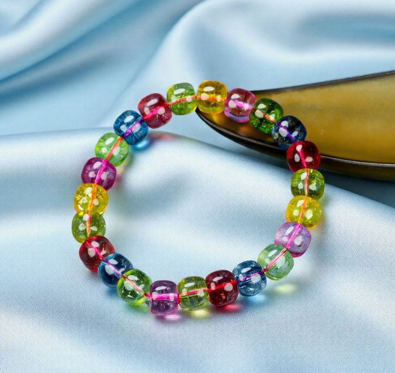 Multi-colored tourmaline barrel bead elastic bracelet - rose red, blue, olive green, yellow, purple, and other colors, crystal clear like rainbow candy.