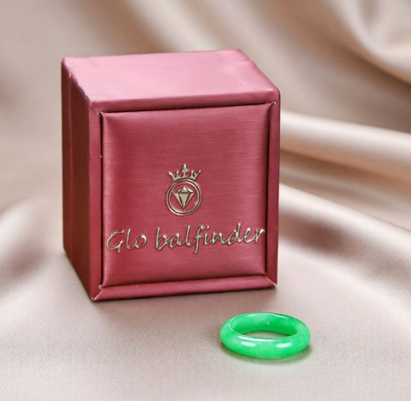 Natural emerald green jadeite plain band ring. Pure natural jadeite, polished into a round band with bright and translucent color.