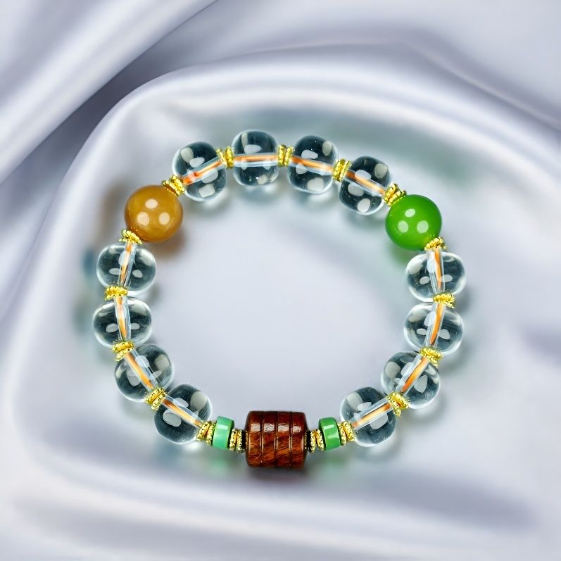 Natural crystal, interspersed wood carvings, and agate beads embellished elastic bracelet – three colors complementing each other, rich in layers