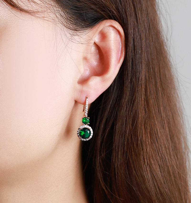 Emerald double crystal rose gold earrings, studs and drops, set with white vanadium, come in a beautiful gift box.