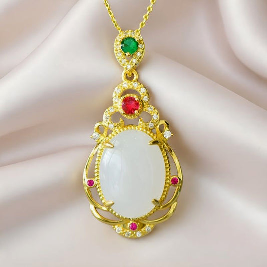 Hetian jade gold openwork teardrop-shaped necklace – rich layers of milky white Hetian jade, rubies, and emeralds, exuding a royal aura.