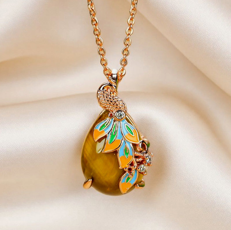 Natural tiger's eye, teardrop shape, enamel peacock, rose gold necklace, embellished with zircon, luxurious and elegant.