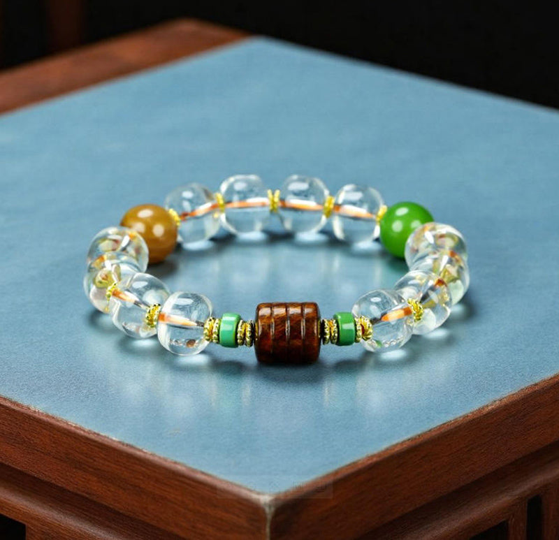 Natural crystal, interspersed wood carvings, and agate beads embellished elastic bracelet – three colors complementing each other, rich in layers