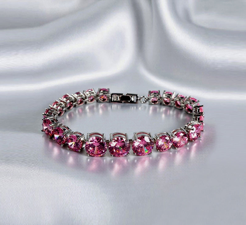 Pink round gemstone tennis bracelet, full row of cut gemstones, four-prong silver base, romantic and sweet.