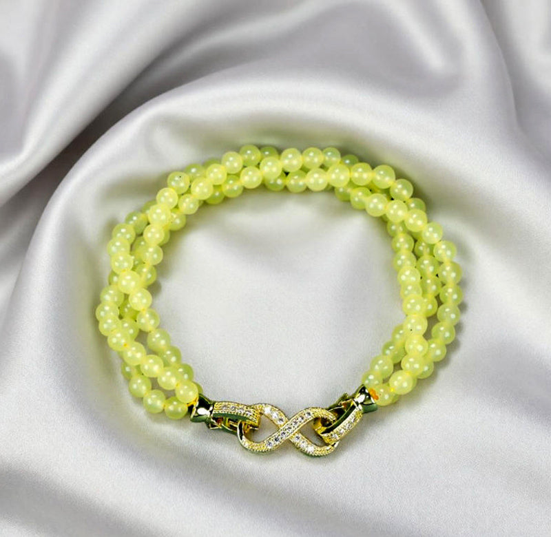 Yellow-green jadeite beaded bracelet with three rows of round beads, gold inlay, multi-bead combination, fresh and gentle.