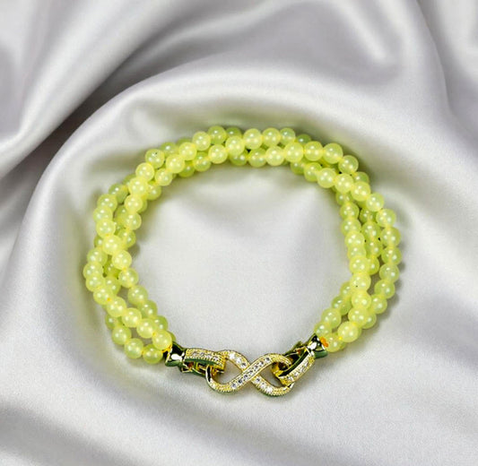 Yellow-green jadeite beaded bracelet with three rows of round beads, gold inlay, multi-bead combination, fresh and gentle.