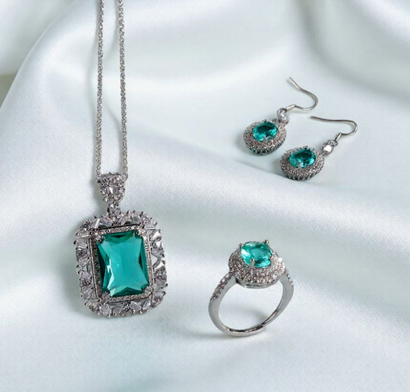 Gorgeous blue-green gemstone three-piece jewelry set, including a necklace, a pair of earrings and a ring, inlaid with white crystals and set in silver base, comes with a gift box