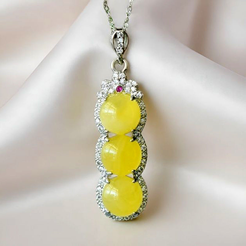 Natural Beeswax "Lucky Bean" 925 Silver Necklace – Plump "Lucky Bean" Bead Symbolizing Abundant Wealth and a Triple Blessing of Fortune and Prosperity.