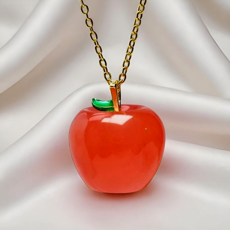 Red Agate Apple Pendant Necklace with Emerald-Green Leaf Clasp – Finely carved apple design symbolizing peace, safety, and a flourishing, vibrant life.