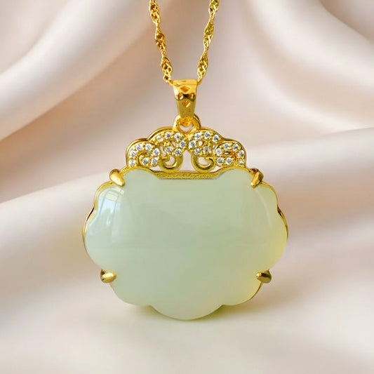 Hetian jade pendant necklace with gold auspicious cloud inlay – Hetian jade is warm, elegant, and symbolizes good fortune and wealth.  Comes with a beautiful gift box