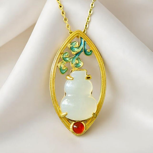 Hetian jade gourd pendant with enamel-painted auspicious clouds and ruby base - exquisitely carved gourd symbolizing good fortune and prosperity.