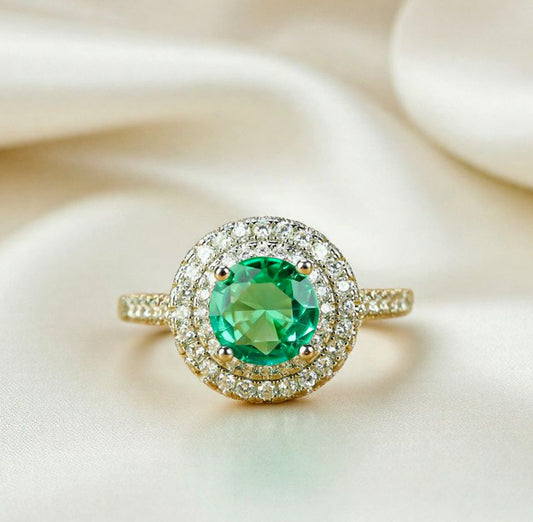 Emerald double-layered zircon halo ring, gold ring with large round-cut gemstones and a gold zircon band