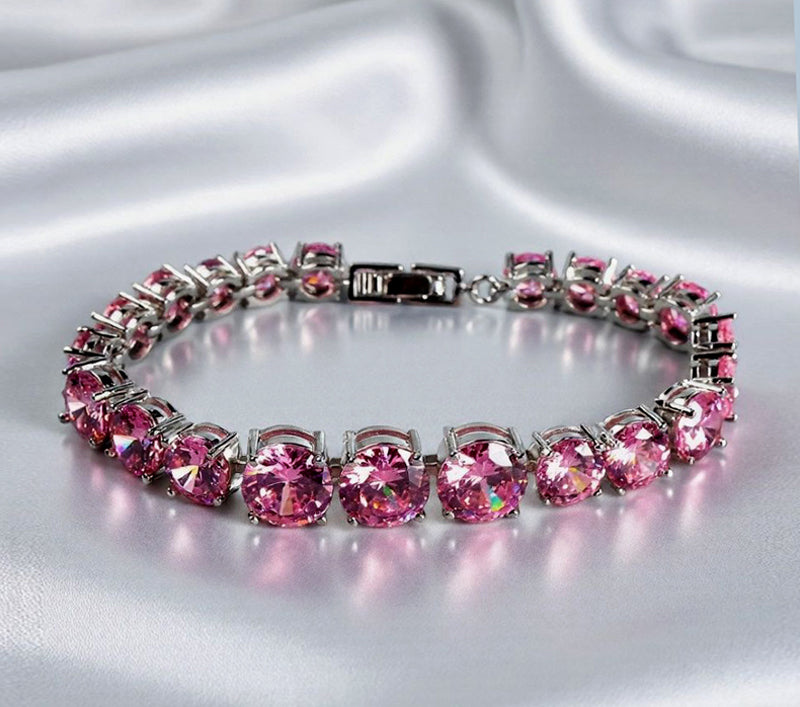 Pink round gemstone tennis bracelet, full row of cut gemstones, four-prong silver base, romantic and sweet.