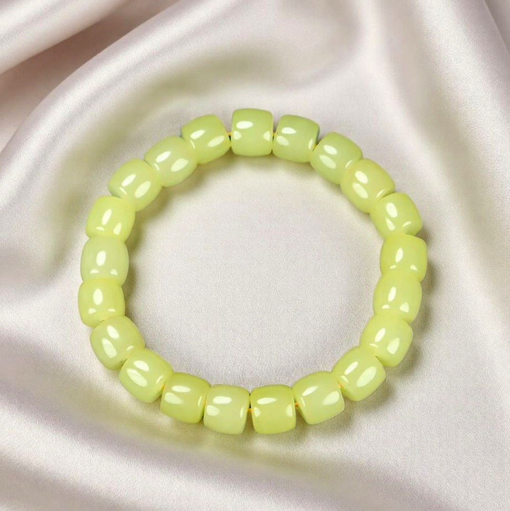 Yellow-green chalcedony barrel bead plain elastic bracelet – fresh and even color, matte and warm texture, simple and pure.