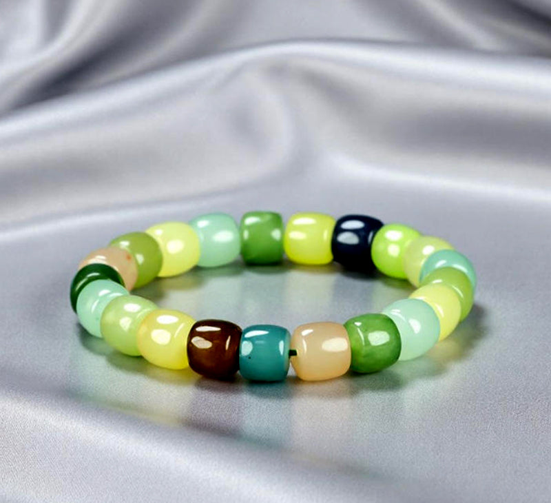 Colorful Jade Barrel Bead Elastic Bracelet - Harmonious mix of yellow, green, mint, emerald green, lake blue, deep blue, milky white, and brown, fresh and elegant.