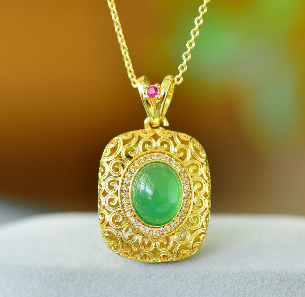 Emerald green chalcedony with gold openwork scroll pattern and square pink gemstone clasp - bright emerald green, magnificent and elegant.