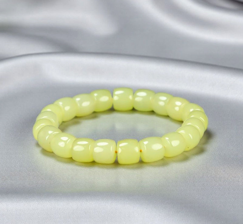 Yellow-green chalcedony barrel bead plain elastic bracelet – fresh and even color, matte and warm texture, simple and pure.