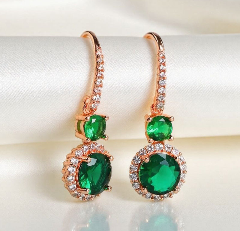 Emerald double crystal rose gold earrings, studs and drops, set with white vanadium, come in a beautiful gift box.