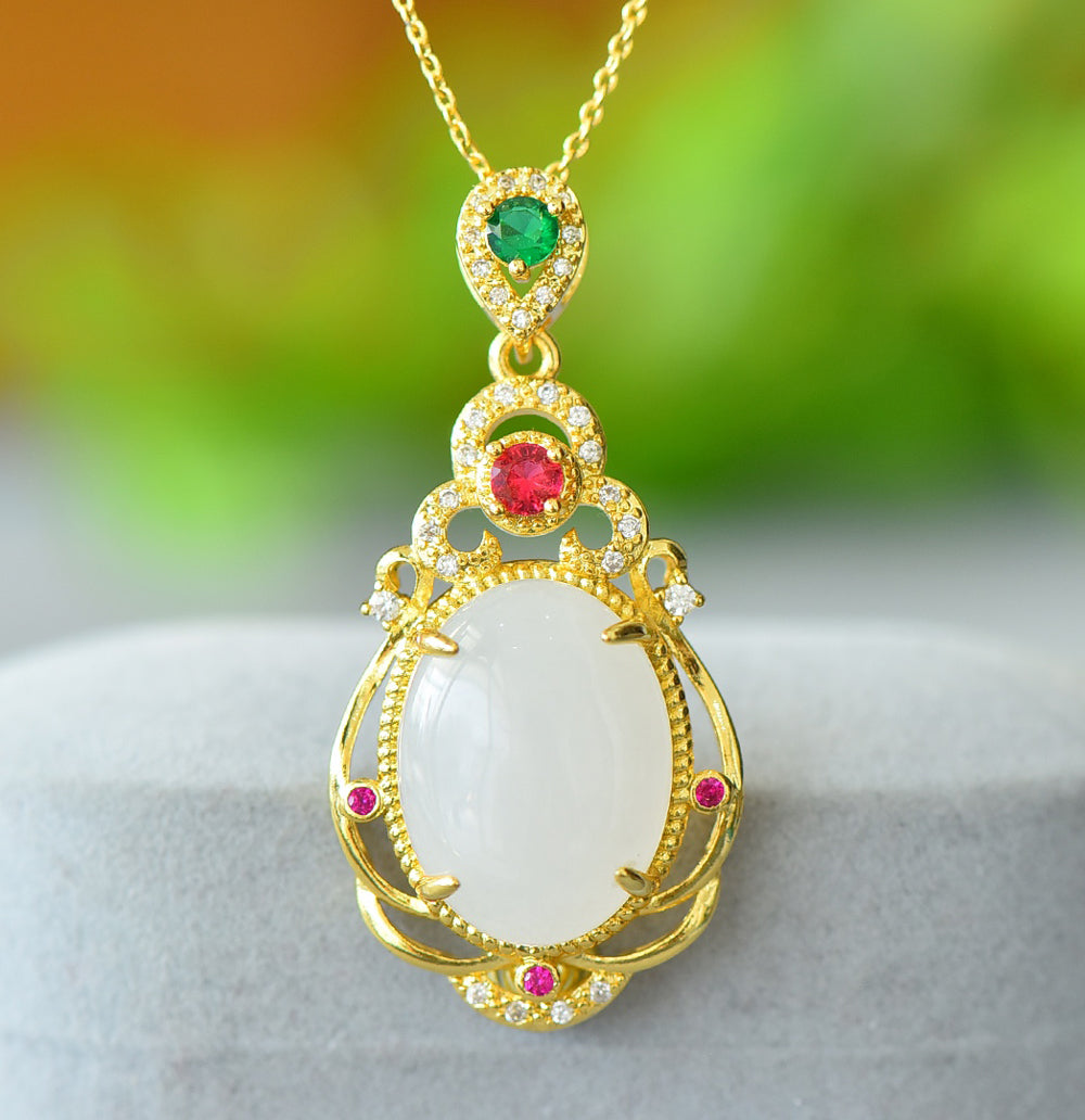 Hetian jade gold openwork teardrop-shaped necklace – rich layers of milky white Hetian jade, rubies, and emeralds, exuding a royal aura.