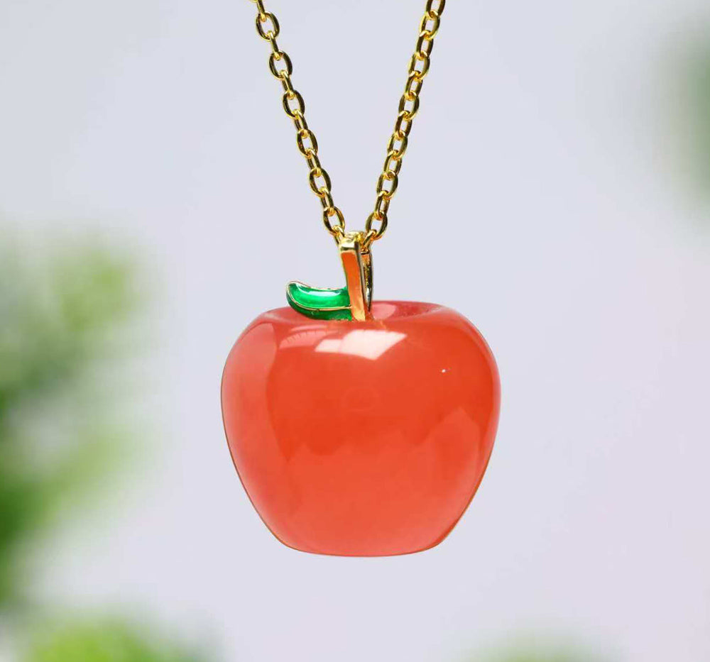 Red Agate Apple Pendant Necklace with Emerald-Green Leaf Clasp – Finely carved apple design symbolizing peace, safety, and a flourishing, vibrant life.