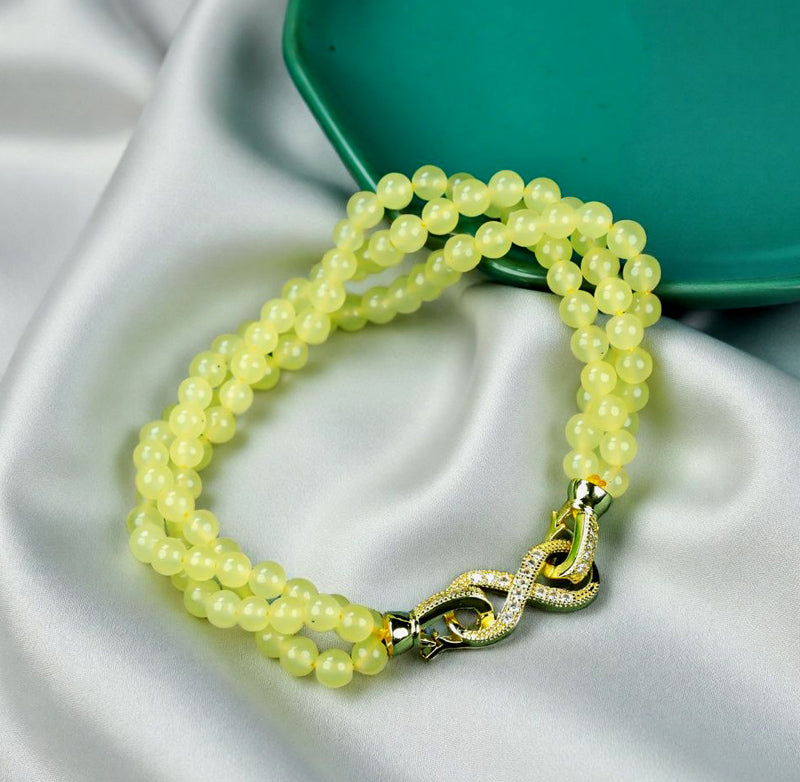 Yellow-green jadeite beaded bracelet with three rows of round beads, gold inlay, multi-bead combination, fresh and gentle.