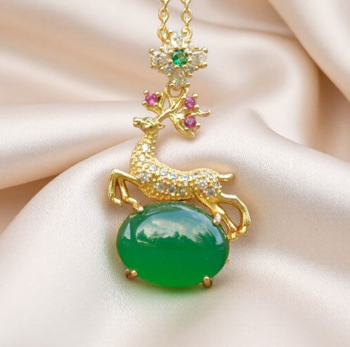 Deer-shaped emerald jade necklace – fully gilded golden deer antlers decorated with red and pink gemstones