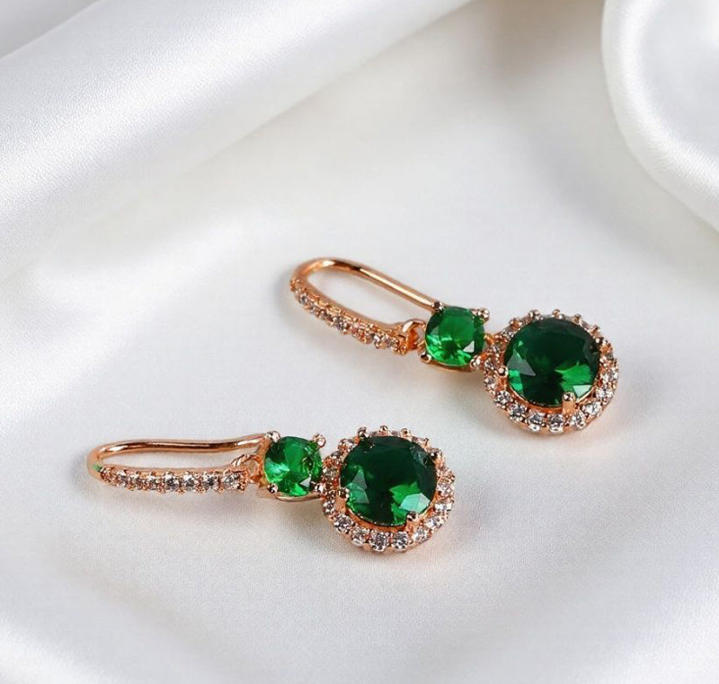 Emerald double crystal rose gold earrings, studs and drops, set with white vanadium, come in a beautiful gift box.