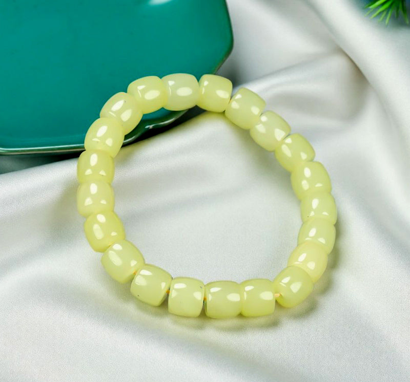 Yellow-green chalcedony barrel bead plain elastic bracelet – fresh and even color, matte and warm texture, simple and pure.