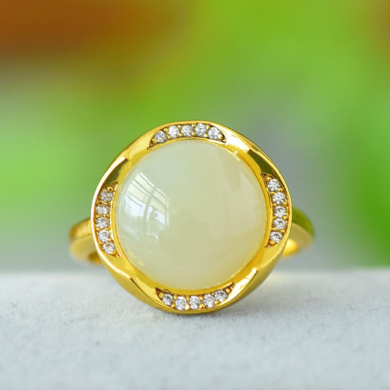 Hetian jade round cabochon ring with gold twisted setting – Hetian jade is warm, elegant, simple, and sophisticated, suitable for everyday wear