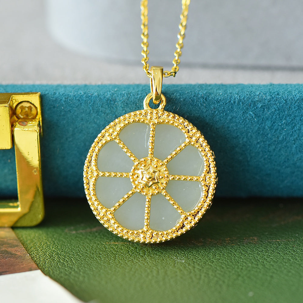 Round Dharma Wheel Necklace with Eight-Petaled Flower Hetian Jade Constructed with white jade segments separated by golden spokes