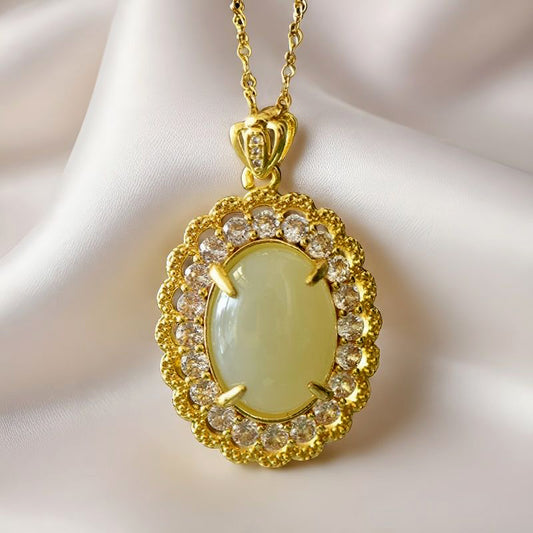 Hetian jade oval main stone with gold-plated carved floral pattern and four-pronged support – Warm and noble crown clasp, elegant and grand.