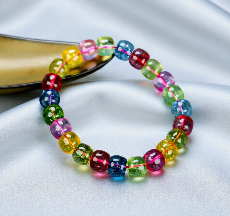 Multi-colored tourmaline barrel bead elastic bracelet - rose red, blue, olive green, yellow, purple, and other colors, crystal clear like rainbow candy.
