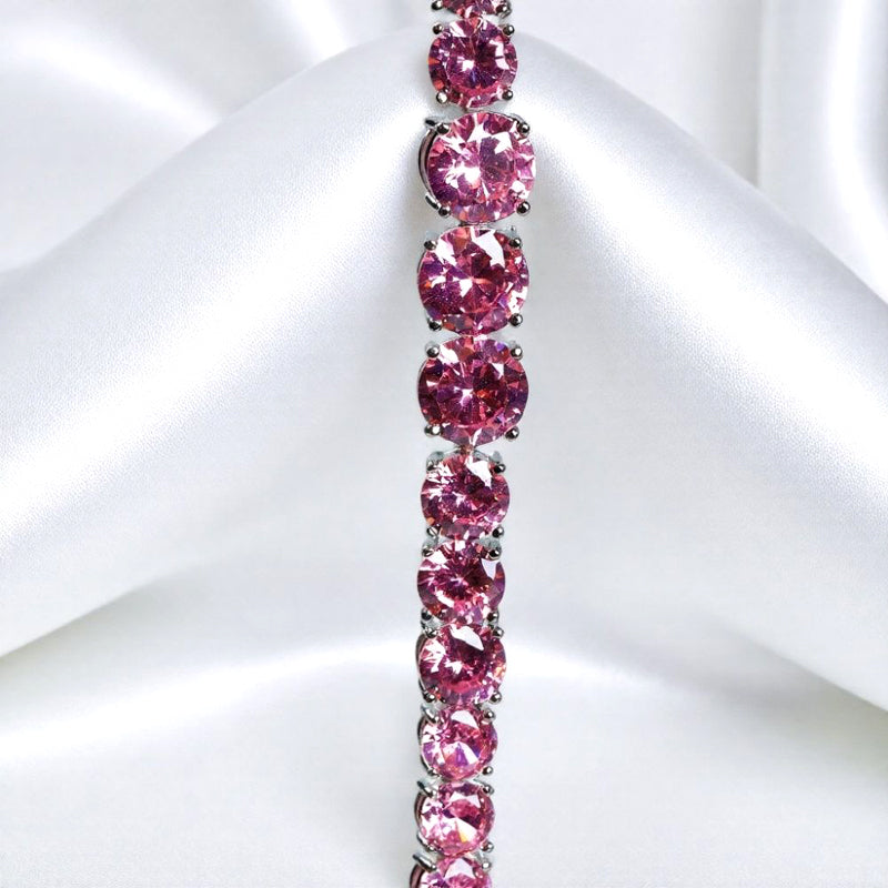 Pink round gemstone tennis bracelet, full row of cut gemstones, four-prong silver base, romantic and sweet.