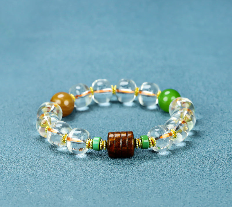 Natural crystal, interspersed wood carvings, and agate beads embellished elastic bracelet – three colors complementing each other, rich in layers