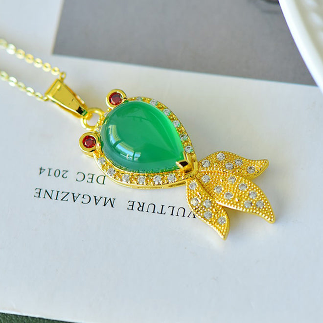 Emerald-Green Chalcedony Goldfish-Shaped Necklace with Ruby Eyes – A charming "wealth-attracting" goldfish symbolizing abundant prosperity and good fortune.