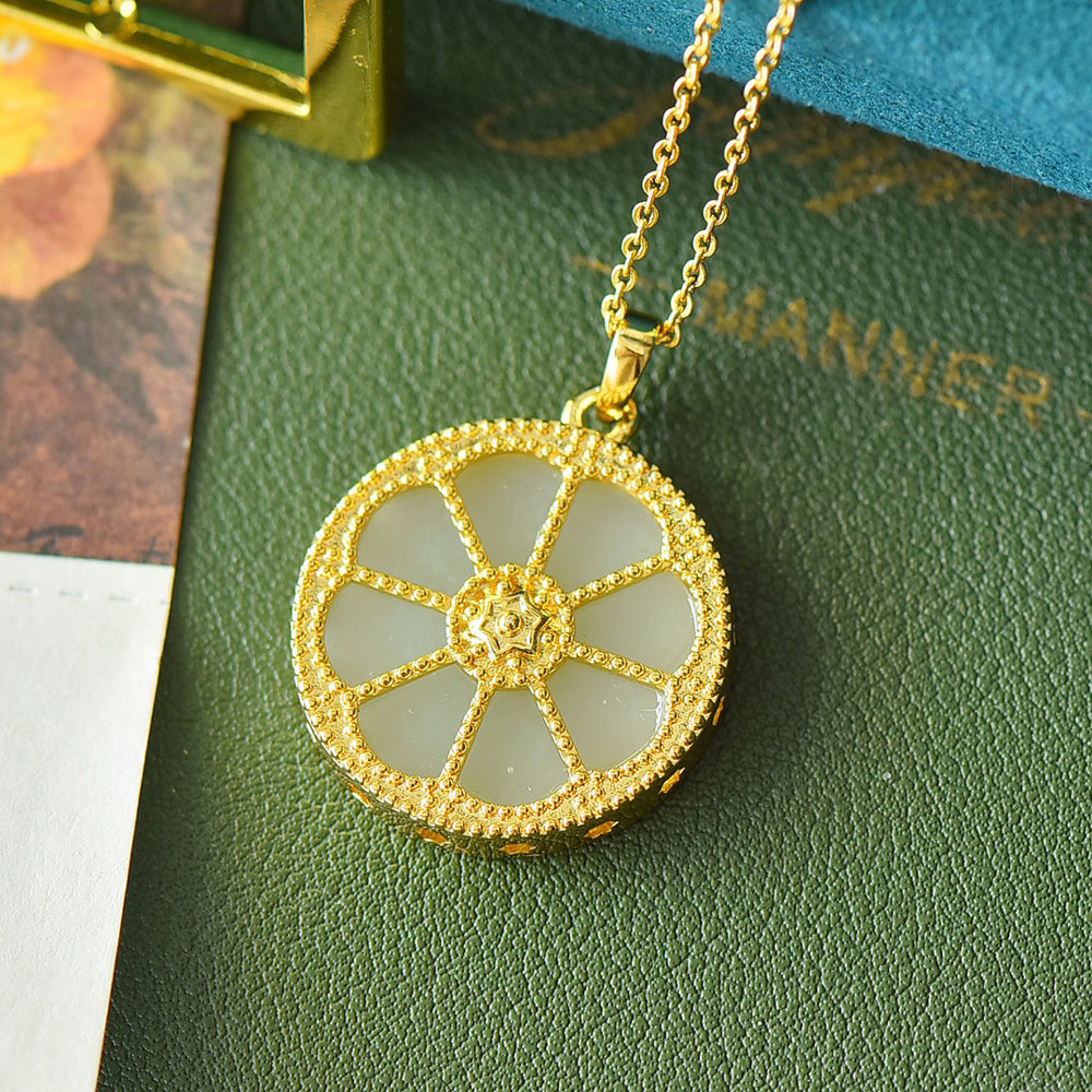 Round Dharma Wheel Necklace with Eight-Petaled Flower Hetian Jade Constructed with white jade segments separated by golden spokes