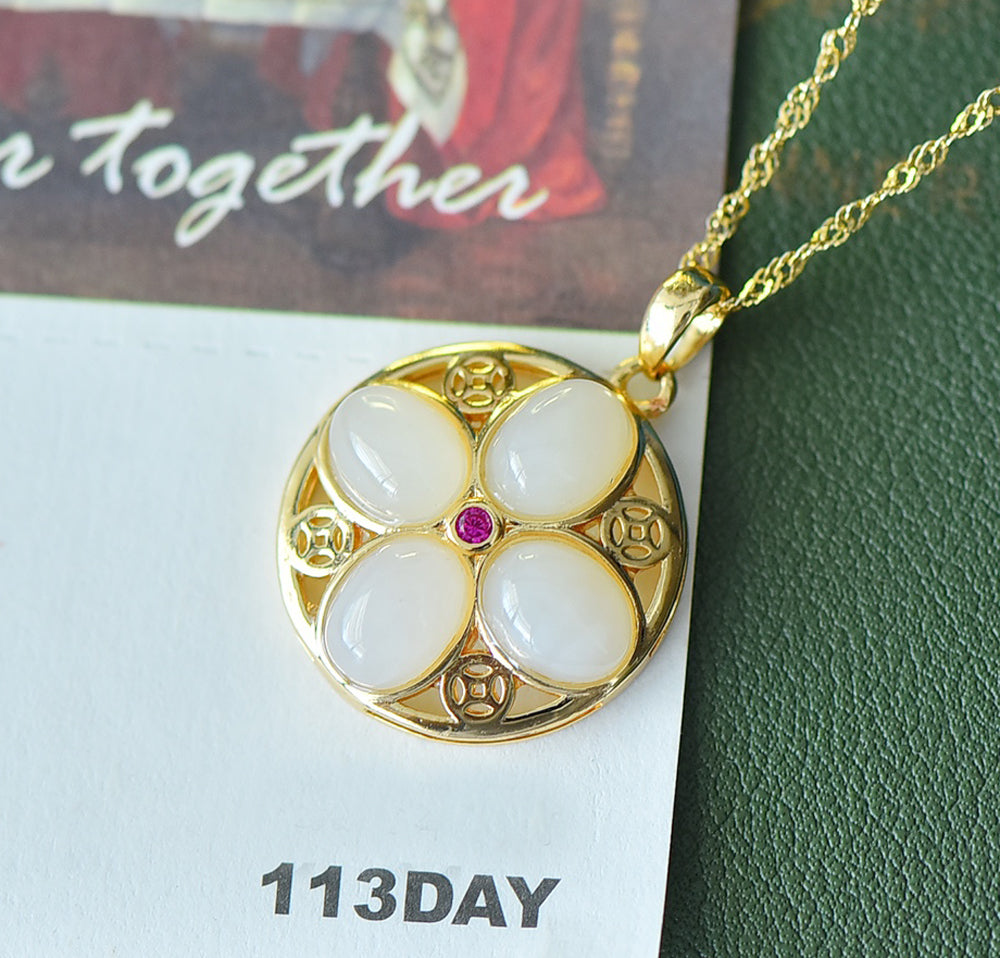 Hetian Jade Four-Petal Flower Pendant Necklace – A symbol of wholeness, auspiciousness, prosperity, and elegance. Comes with an exquisite gift box