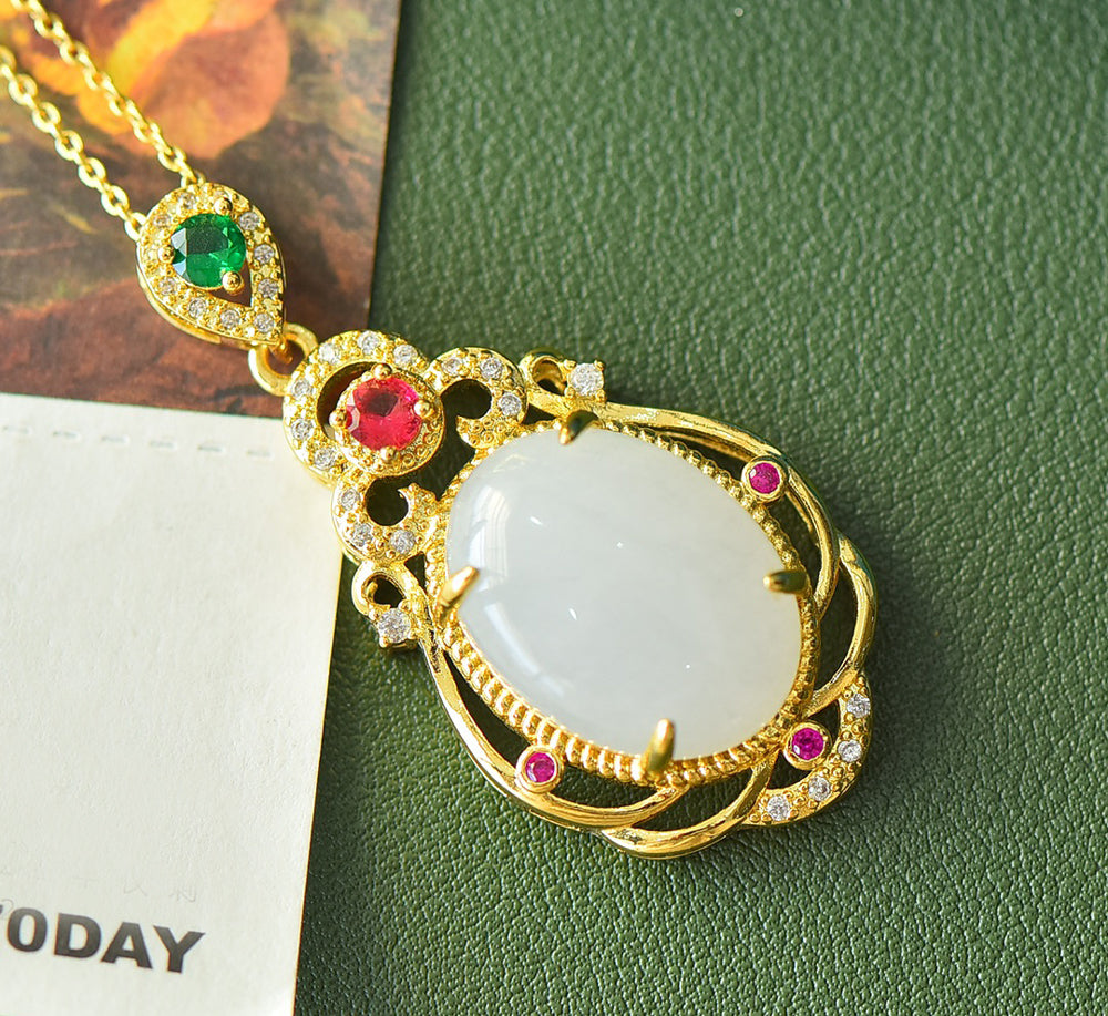 Hetian jade gold openwork teardrop-shaped necklace – rich layers of milky white Hetian jade, rubies, and emeralds, exuding a royal aura.