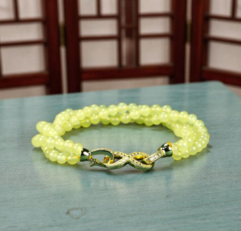 Yellow-green jadeite beaded bracelet with three rows of round beads, gold inlay, multi-bead combination, fresh and gentle.