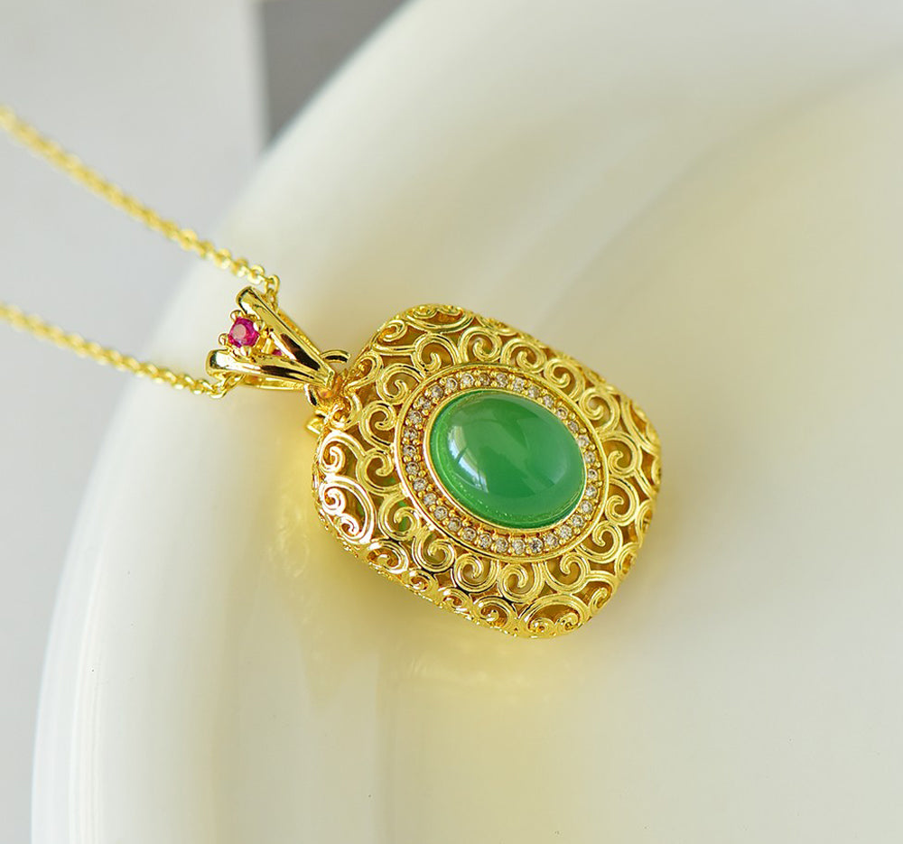 Emerald green chalcedony with gold openwork scroll pattern and square pink gemstone clasp - bright emerald green, magnificent and elegant.