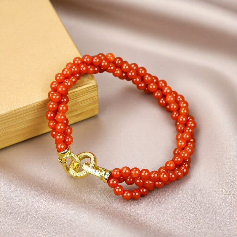 Natural red agate small round bead three-row bracelet – gold ring clasp for auspiciousness, good fortune, and protection from evil.