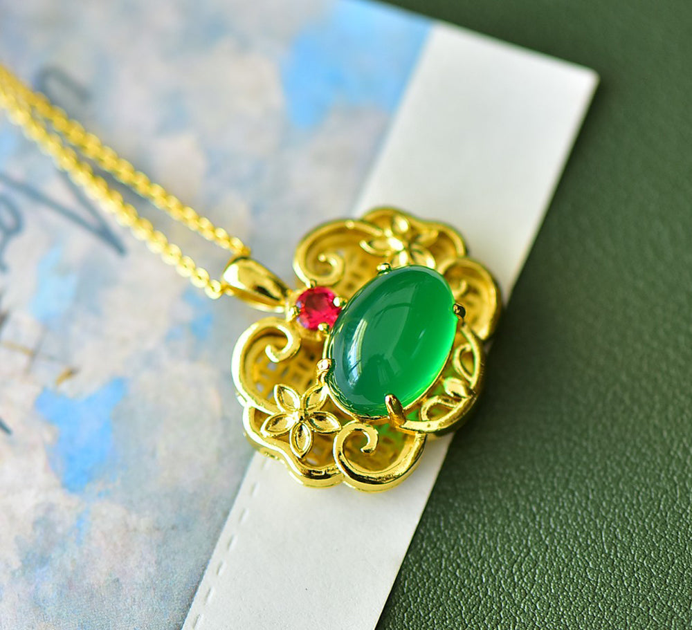 A Green Jade Necklace with Auspicious Cloud Mirror Design – Framed with Golden Auspicious Clouds and Adorned with Rubies