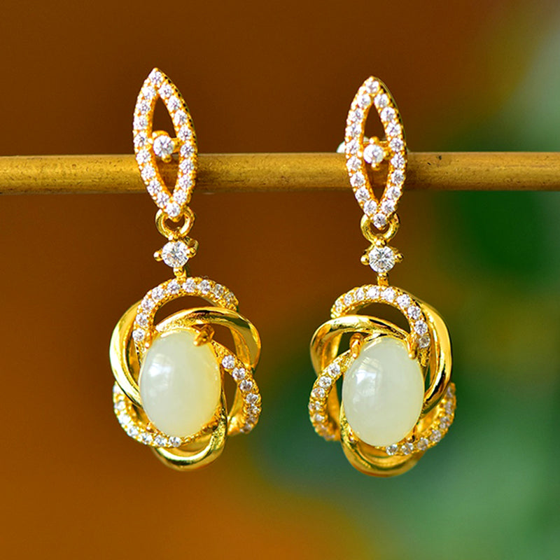 A pair of Hetian jade gold twisted scroll spherical earrings – Hetian jade, noble, elegant, luxurious and grand.