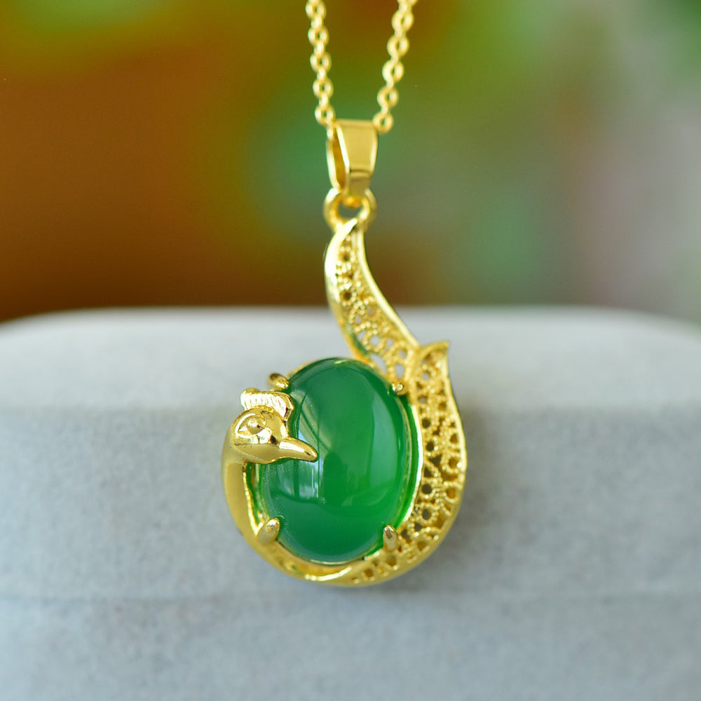 Phoenix-shaped emerald jade necklace – Golden phoenix tail feathers inlaid with emerald jade