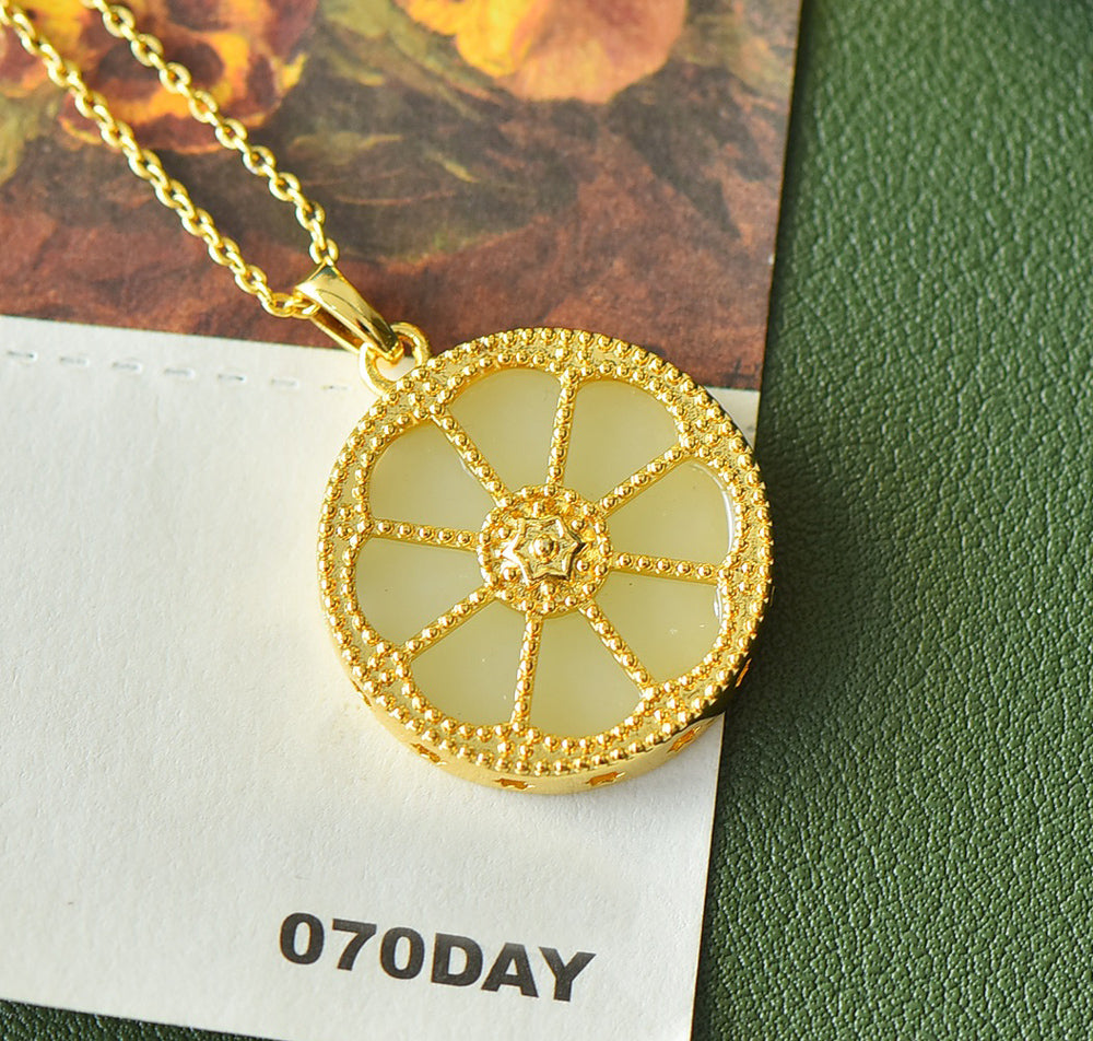 Round Dharma Wheel Necklace with Eight-Petaled Flower Hetian Jade Constructed with white jade segments separated by golden spokes