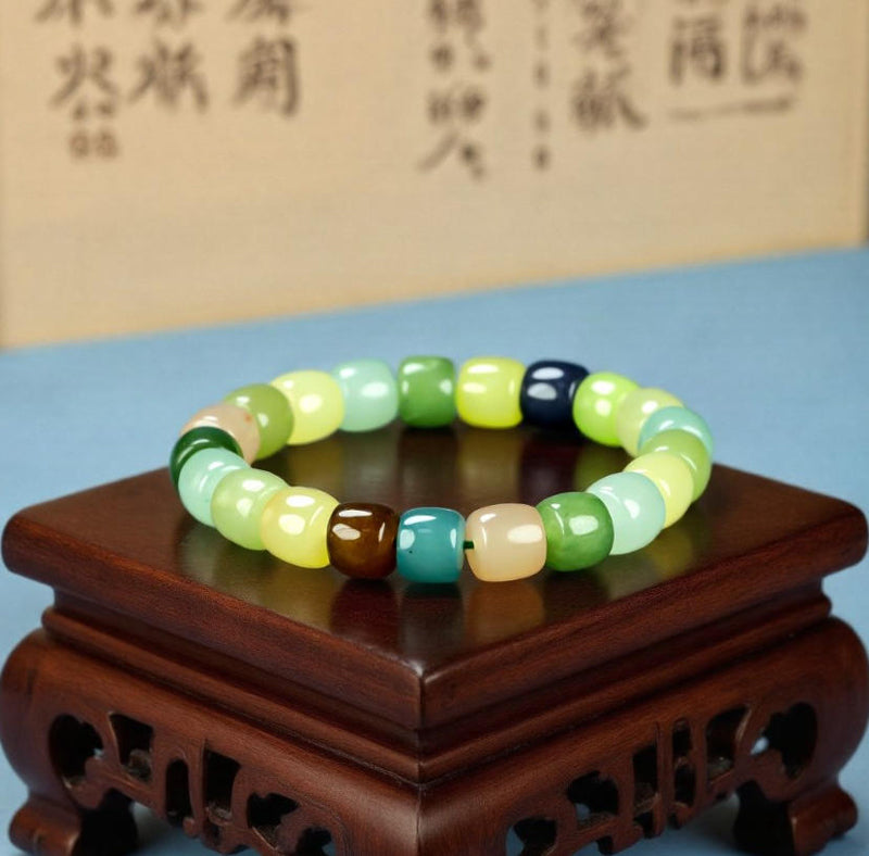 Colorful Jade Barrel Bead Elastic Bracelet - Harmonious mix of yellow, green, mint, emerald green, lake blue, deep blue, milky white, and brown, fresh and elegant.
