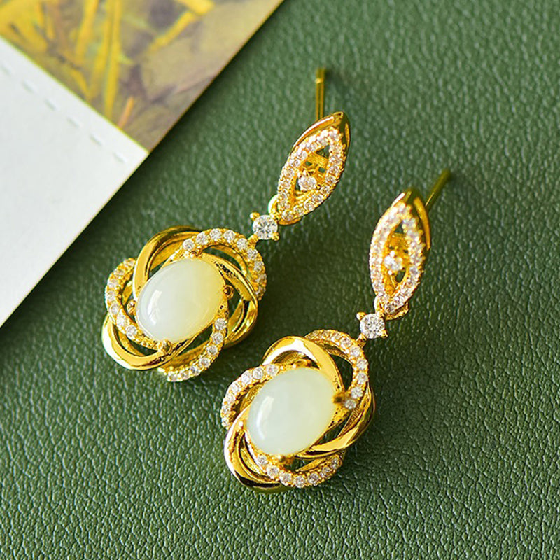 A pair of Hetian jade gold twisted scroll spherical earrings – Hetian jade, noble, elegant, luxurious and grand.