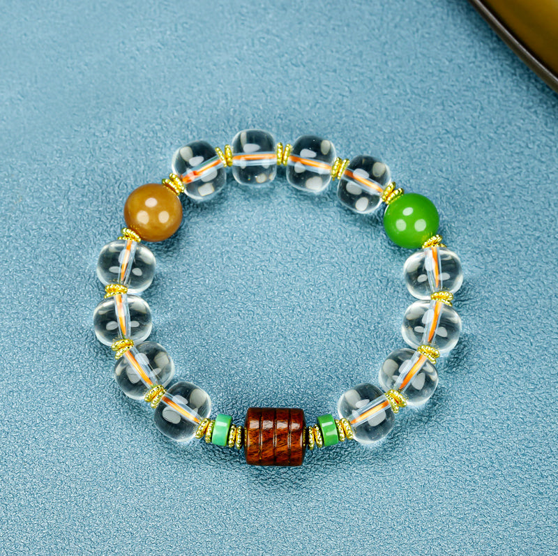 Natural crystal, interspersed wood carvings, and agate beads embellished elastic bracelet – three colors complementing each other, rich in layers