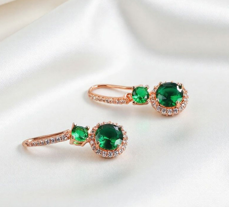 Emerald double crystal rose gold earrings, studs and drops, set with white vanadium, come in a beautiful gift box.