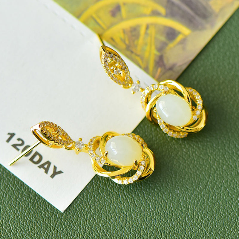 A pair of Hetian jade gold twisted scroll spherical earrings – Hetian jade, noble, elegant, luxurious and grand.